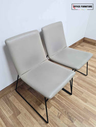 Pair Of Cream Faux Leather Visitor Chairs