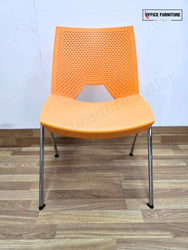 Orange Strike Stackable Plastic Chair by Paolo Scagnellato