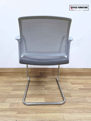 Steelcase Round Table with 2 Boss Design Mars Cantilever Armchairs