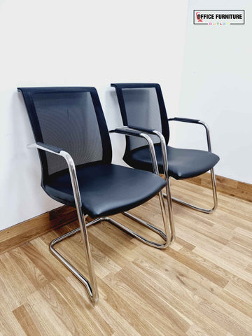 Narbutas Black Faux Leather Cantilever Chairs (Pair)
