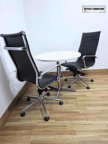 White Round Meeting Table with 2 Black Faux Leather Office Chairs