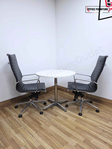 White Round Meeting Table with 2 Black Faux Leather Office Chairs