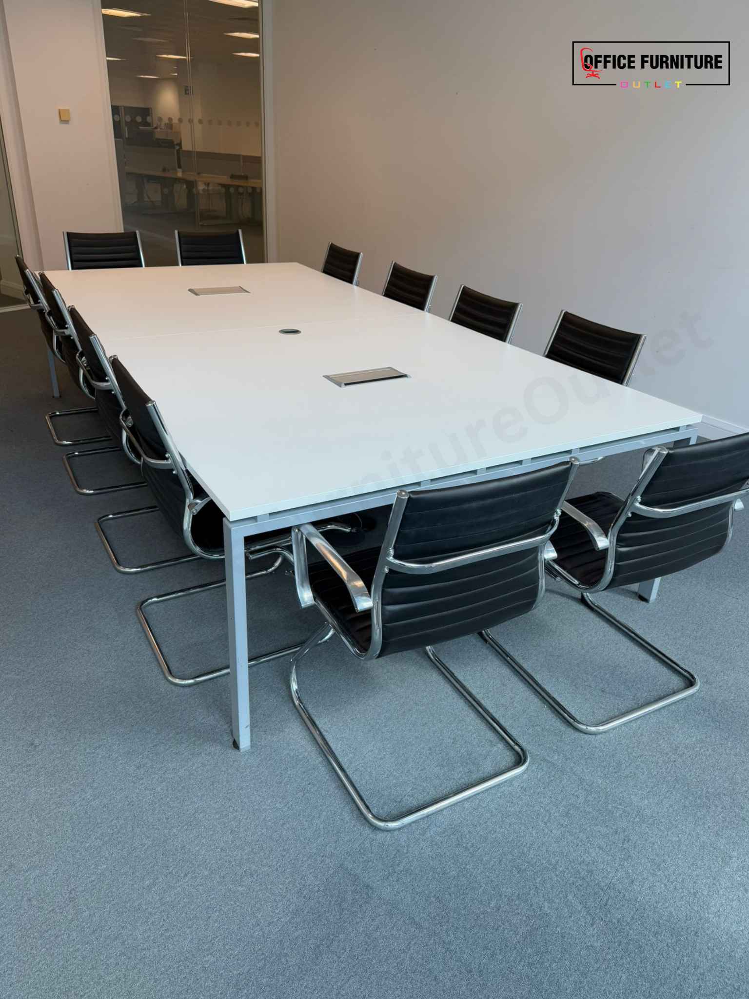 12-Person White Boardroom Table with Cantilever Chairs