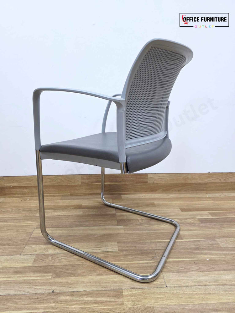 Steelcase Round Table with 2 Boss Design Mars Cantilever Armchairs