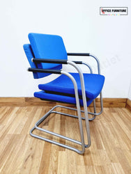 Beech Round Table with 4 Blue Verco Cantilever Chairs