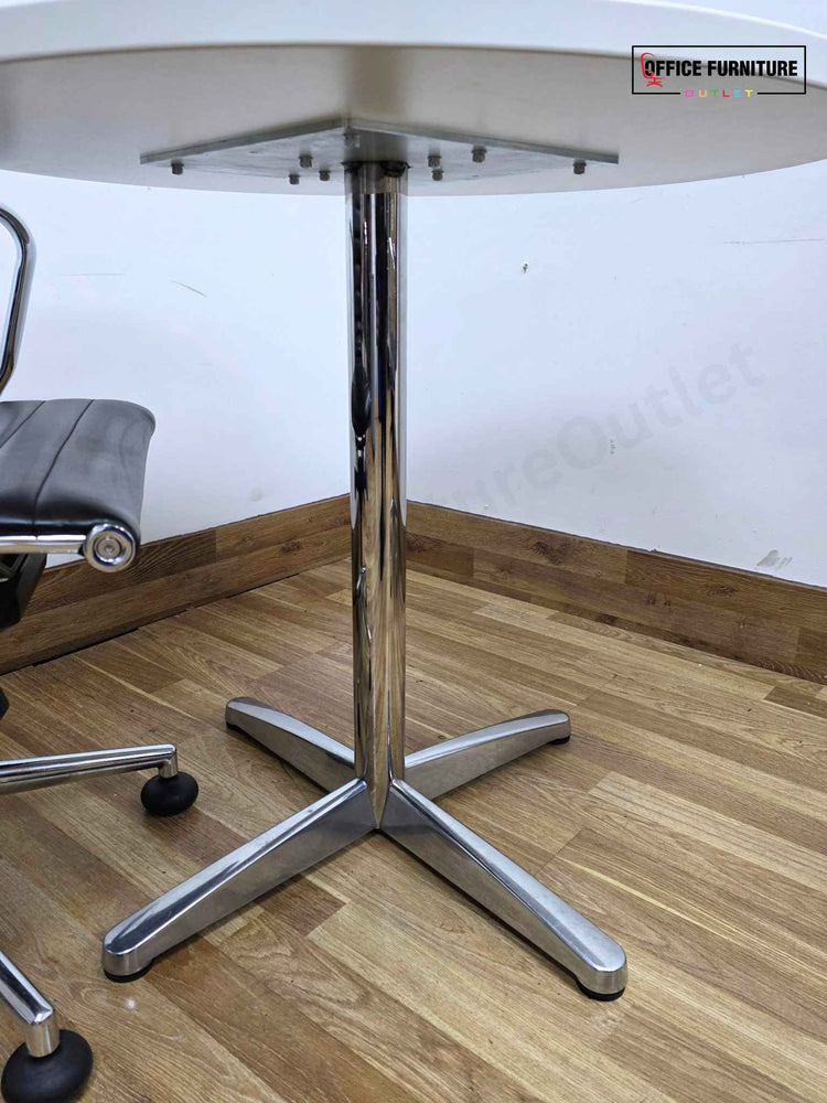 White Round Meeting Table with 2 Black Faux Leather Office Chairs